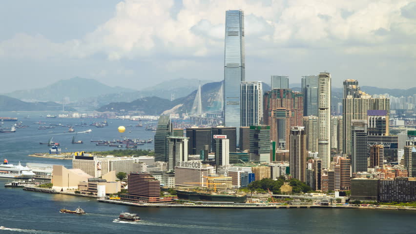 HONG KONG - AUGUST 6: Time lapse of Hong Kong Victoria Harbor and Kowloon