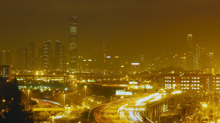 Hong Kong city skyline night traffic ( Time lapse )