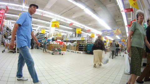 MOSCOW - JUN 15: (Timelapse View) People make purchases in Ashan hypermarket, on Jun 15, 2012 in Moscow, Russia. Auchan chain plans to launch its first Auchan Drive outlet in Moscow next year. 
