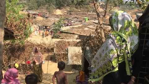 TEKNAF, BANGLADESH - APRIL 1, 2017 : The situation in the refugee camp of wooden huts rohingya Kutupalong near Cox's Bazar, Bangladesh