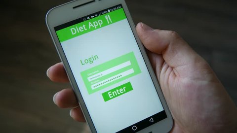 Using a diet application on a smartphone screen.