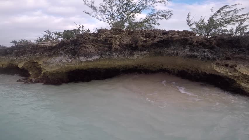 pov rocky shoreline looking