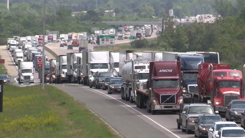 Cambridge, Ontario, Canada June 2017: Epic traffic jam and gridlock on Ontario highway 401 with cars and trucks