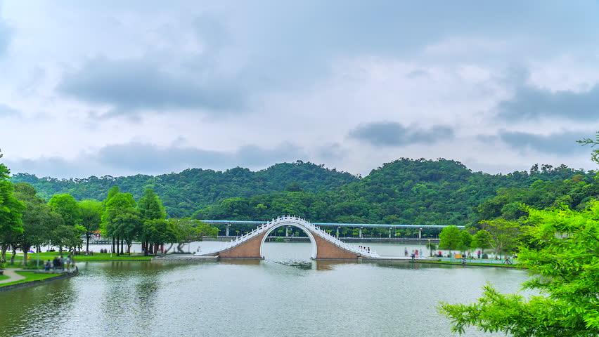 4K.Time lapse Dahu Park Bridge Neihu District and lake at taipei of Taiwan Royalty-Free Stock Footage #27692674
