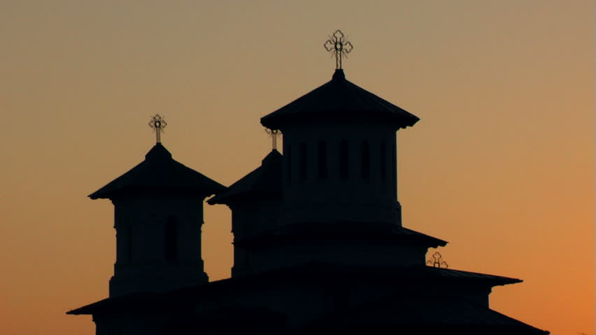 Old Christian Church in sunset (silhouette)...