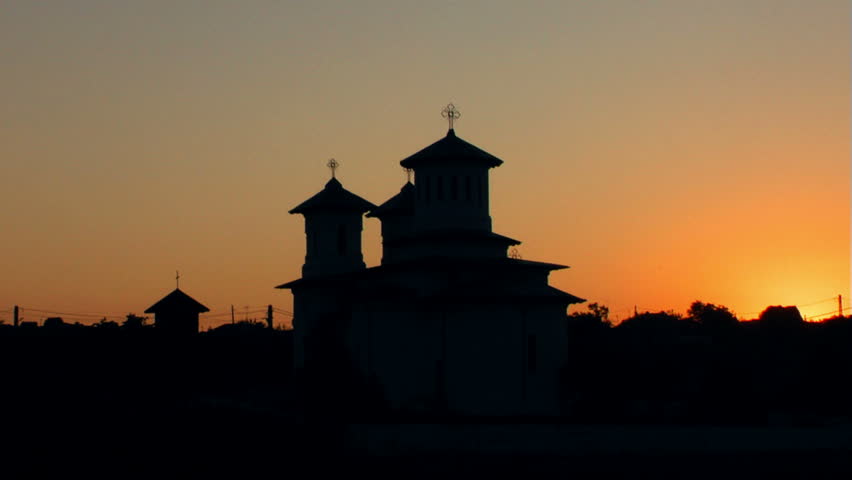 Old Christian Church in sunset (silhouette)...