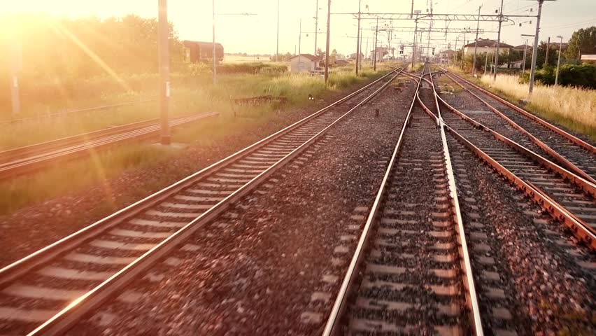 Railroad tracks while the train travels fast. Royalty-Free Stock Footage #27710602