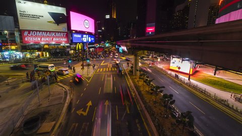 KUALA LUMPUR - APRIL 23: Night time lapse of traffic on Jalan Bukit Bintang in Kuala Lumpur Malaysia on 23 April 2017. Motion Time lapse Pan Up.
