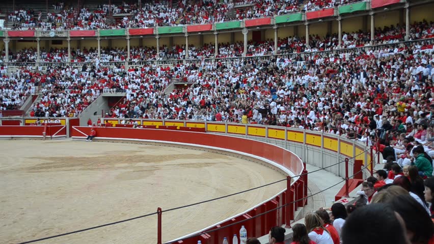 PAMPLONA, SPAIN - CIRCA JULY 2012: Bull ring and spectators during San Fermin