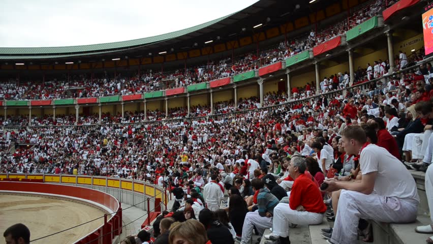PAMPLONA, SPAIN - CIRCA JULY 2012: Bull ring and spectators during San Fermin