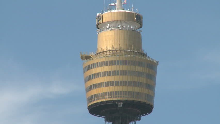 SYDNEY, AUSTRALIA, MAR 22, 2009: Close-Up of Sydney Tower with a plane passing