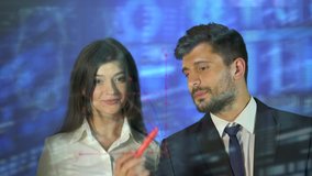 The two business people draw on the virtual board. crane shot - Powered by Shutterstock - Get 15% off with code: PIKWIZARD15