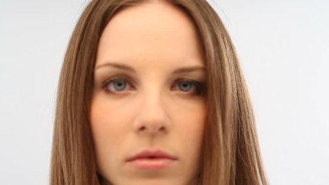 Close-up of a serious young woman; Full HD Photo JPEG
