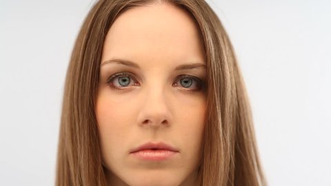 Close-up of a serious young woman; Full HD Photo JPEG
