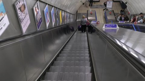 London,UK-May 30, 2017:Charing Cross Underground station descending escalator