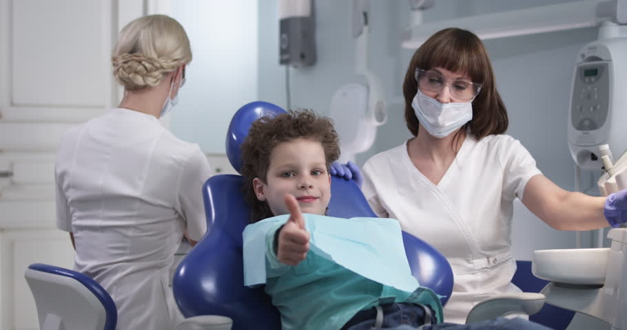The kid in the dentist chair. Positive emotions | Shutterstock HD Video #27742687