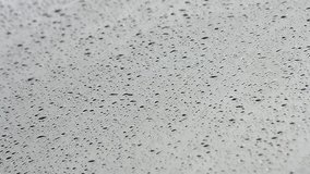 Raindrops on back glass of car
