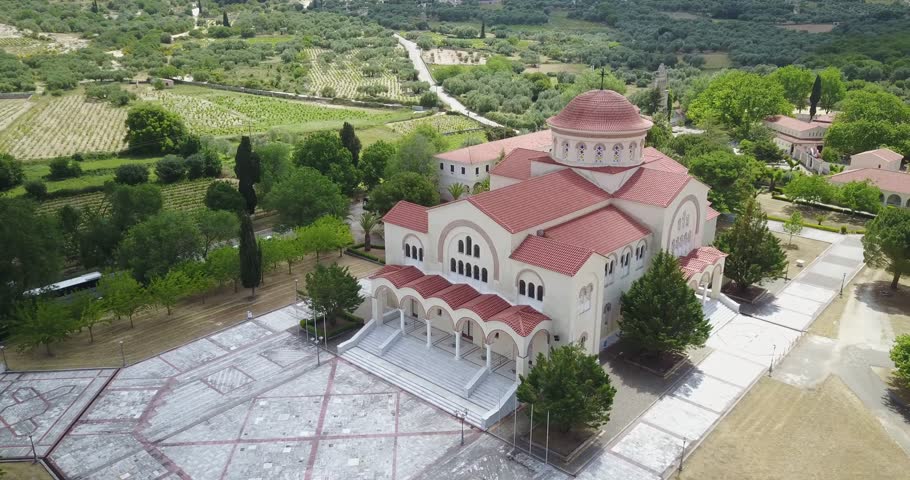 Aerial Drone Footage of a church amongst the rolling hills in Kefalonia, Greece.