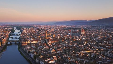 florence aerial shot at sunrise flying over city center cut two