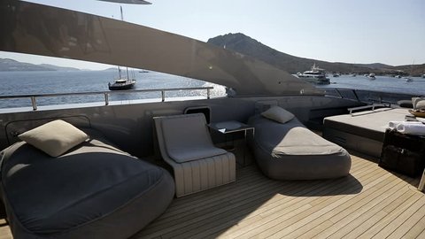 Interior of luxury motoryacht or motor boat on a warm sunny summer day. Wealth, money and lifestyle concept. Leisure activity.