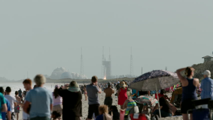 Rocket launch in Florida with people in the foreground watching lift-off - super slow motion Royalty-Free Stock Footage #27764305