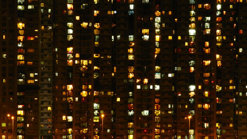 High-density apartment block at night, Hong Kong. ( Time lapse )