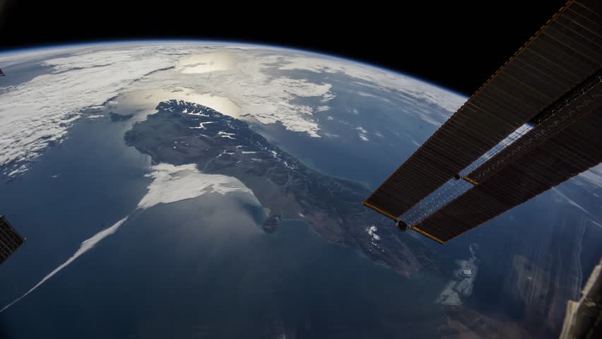 Planet Earth seen from the International Space Station (ISS) over New Zealand from day to sunset. Image courtesy of NASA. 

 Royalty-Free Stock Footage #27767221