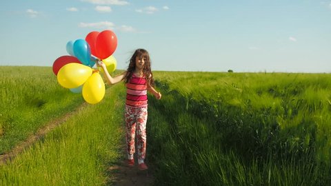 Child with balloons.