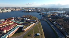 Aerial drone flight video with view of Peter and Paul Fortress in St.-Petersburg, views of Neva River, Russia