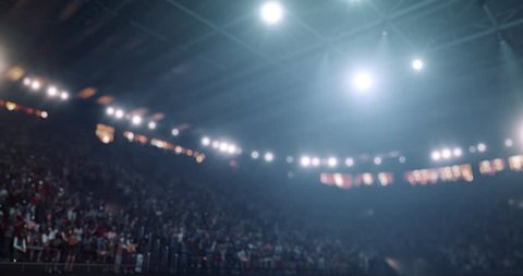 4K footage in slow motion  basketball player dribbling in front of rival player. The action takes place in 3d made basketball arena full of spectators. All players wear unbranded basketball uniform.