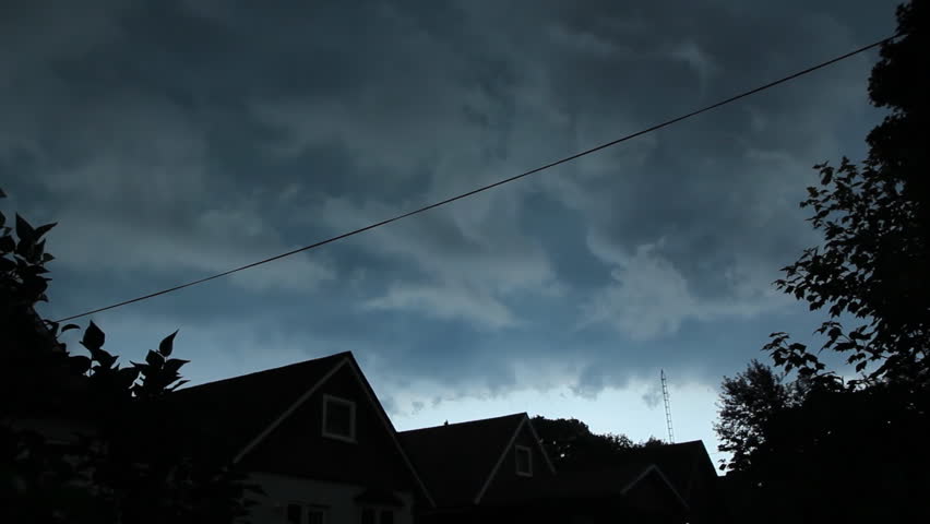 Suburban storm clouds.
Dark storm clouds gather over suburbia.  East York, Ontario, Canada.
