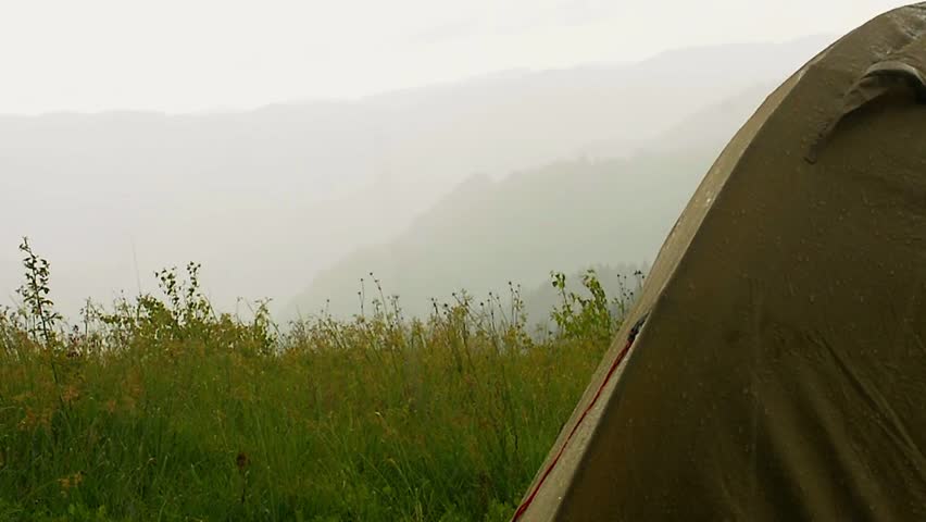 Heavy rain over the camping tent
