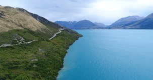 New Zealand aerial drone video nature landscape on South Island, lake Wakatipu and southern alps between Queenstown and Glenorchy. New Zealand travel tourist destinations.