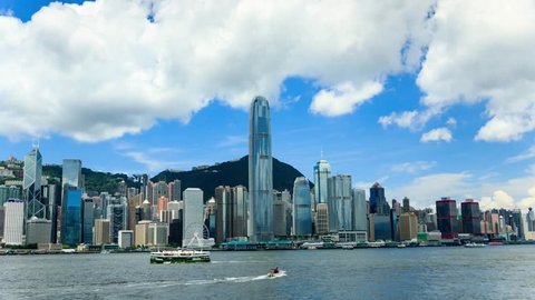 Hong Kong, China - june 08, 2017: Victoria Harbor and Hong Kong Island Skyline. timelapse