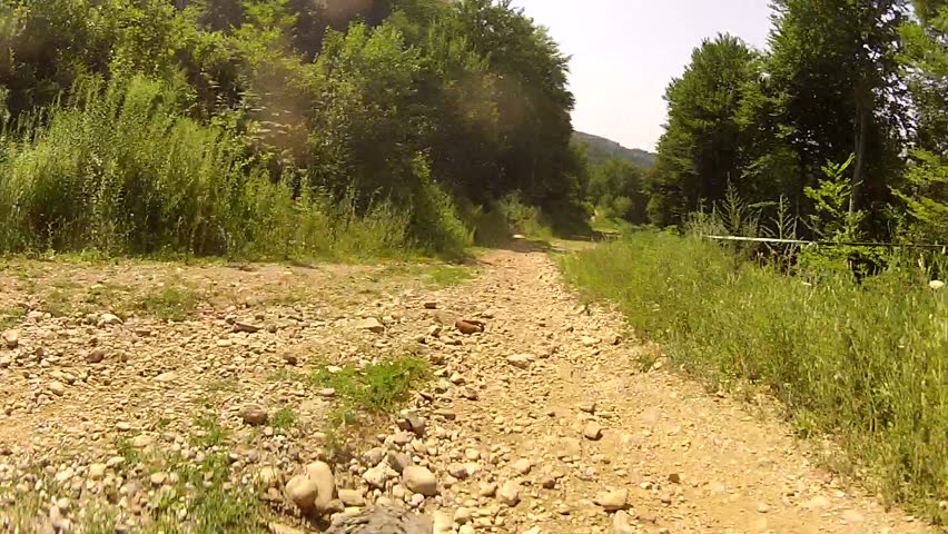 Downhill front view. falling off bike pov. 