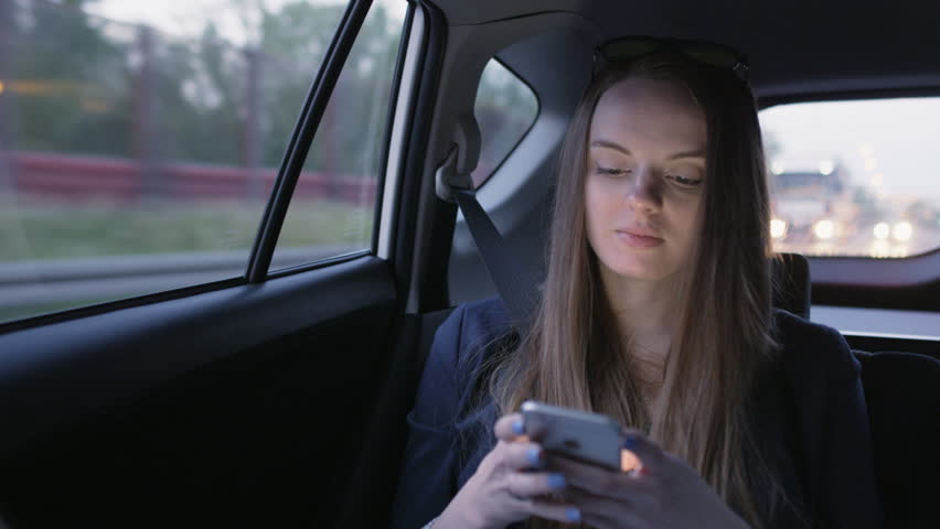 Young Businesswoman During a Nice Phone Call in the Car | Shutterstock HD Video #27810358