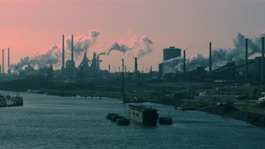 Coal Central in North Sea Canal of port of Amsterdam, with a coal transshipment volume of 16 million tonnes, expects a reduction over the next five years in order to prevent global warming Royalty-Free Stock Footage #27815659