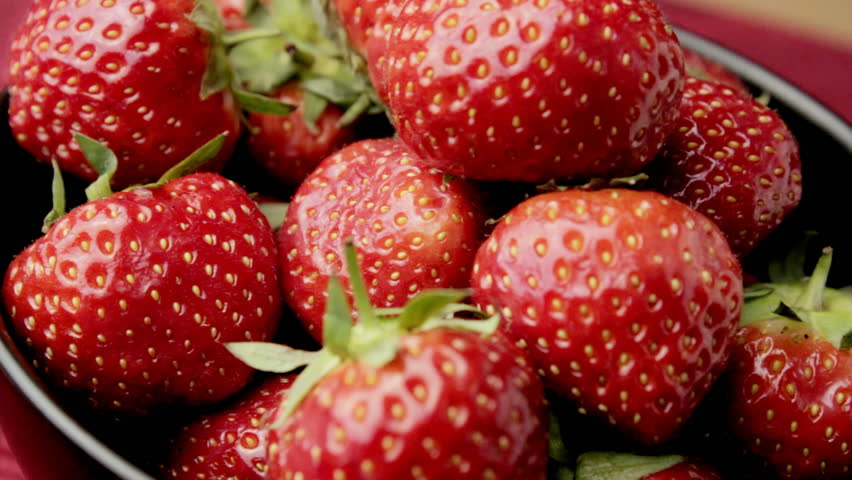 Close up strawberries rotating