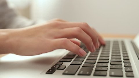 Woman using on notebook computer at home