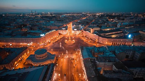 Aerial shot of the night view of car traffic on the Vosstaniya square. The obelisk to Hero City of Leningrad, St. Petersburg, Russia
