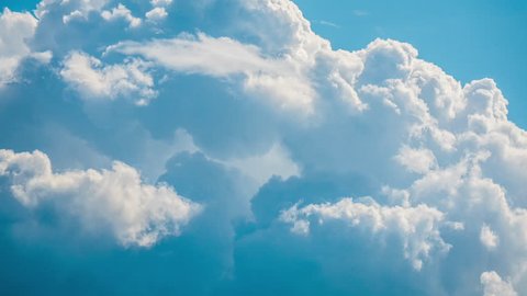Blue sky white clouds background time lapse. Beautiful nature color timelapse. Beauty of summer day weather. Bright light high in air heaven. Fluffy cloudy cumulus cloudscape, scenic sunlight, climate