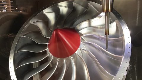 Milling aluminum turbine in five axis CNC machine.