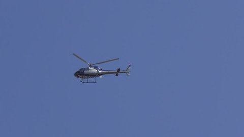 Israeli police helicopter with loud speakers instructs citizens what to do after earthquake rocket attack tsunami during Operation Turning Point 17 drill. Karmiel Israel, June 14th, 2017