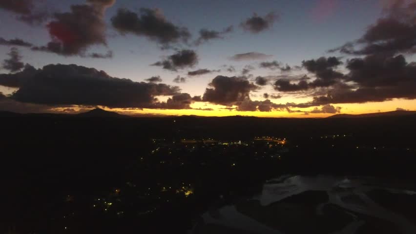 sunset flying over river