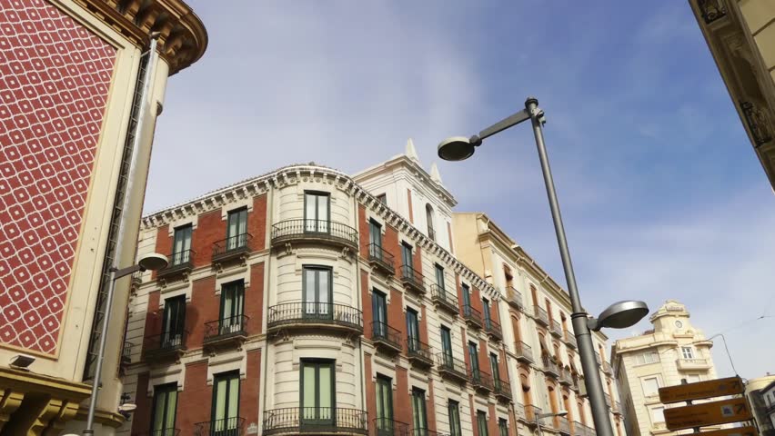 Street Recogidas in Granada. Granada is city in autonomous community of Andalusia, Spain, located at foot of Sierra Nevada mountains, on rivers Beiro, Darro, Genil and Monachil.