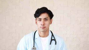 Smiling Asian medical doctor 
