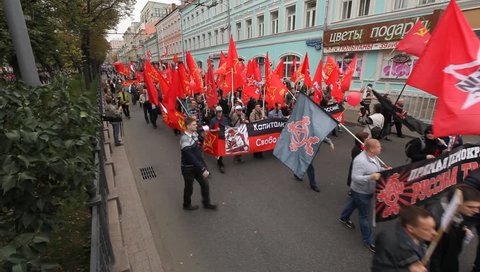 MOSCOW - SEPTEMBER 15: Opposition activists and supporters take part in an anti-Putin protest on September 15, 2012 in Moscow, Russia. Thousands marched through Moscow to protest against the rule of V.Putin.