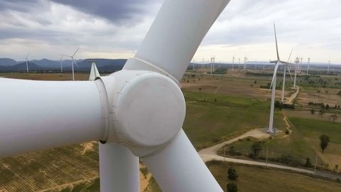 Wind turbine farm from aerial view by drone. Renewable energy, sustainable development, environment friendly concept.