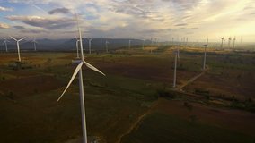 Wind turbine farm from aerial view by drone. Renewable energy, sustainable development, environment friendly concept.