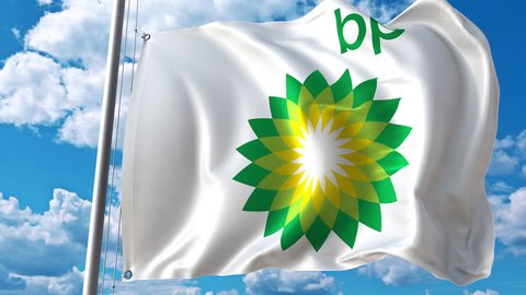 Waving flag with BP logo against moving clouds. 4K editorial animation